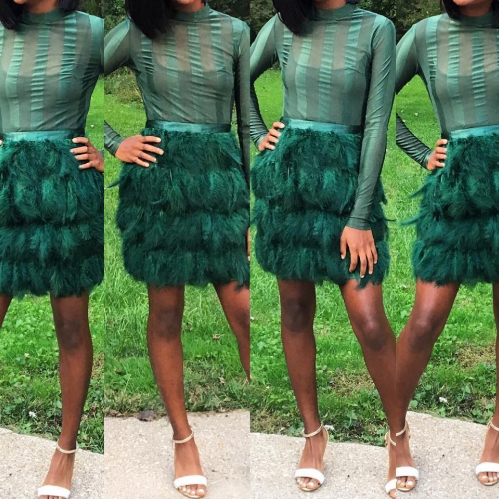Sheer top, Feathered bottom mini dress. Green. Unnoticeable rip in left sleeve